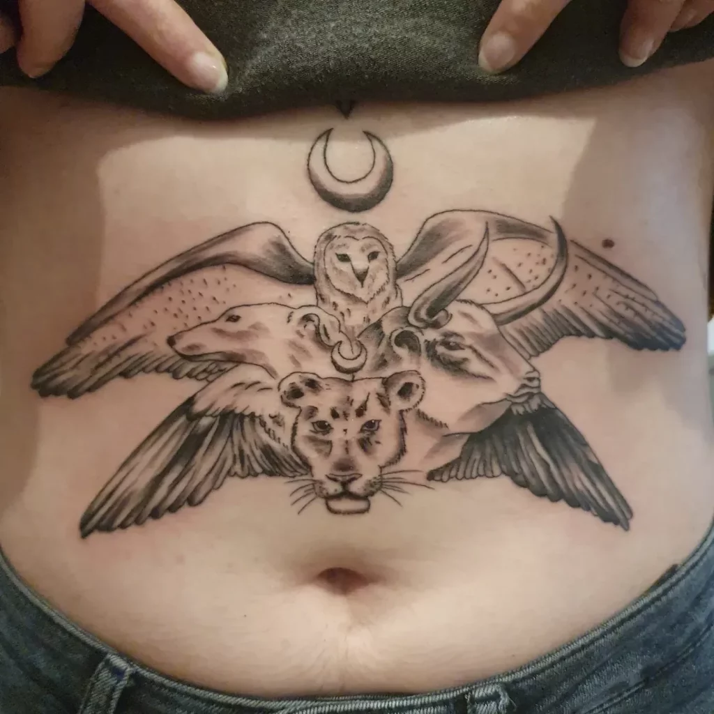 black and grey tattoo, a bull, a lioness, a barn owl and a greyhound as centerpieces, with 4 wings around them and a crescent moon on top, facing upwards.